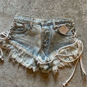 Vintage denim cutoff shorts with ties at side